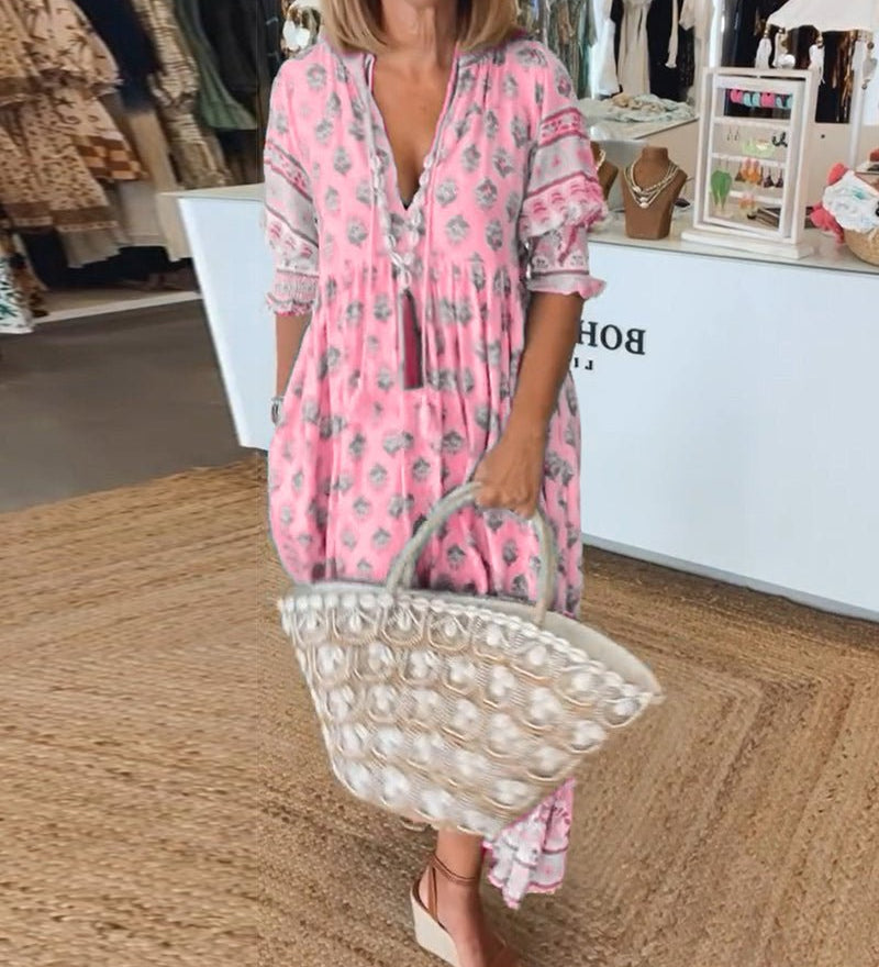 Marit | Chique midijurk met bloemenprint en V-hals